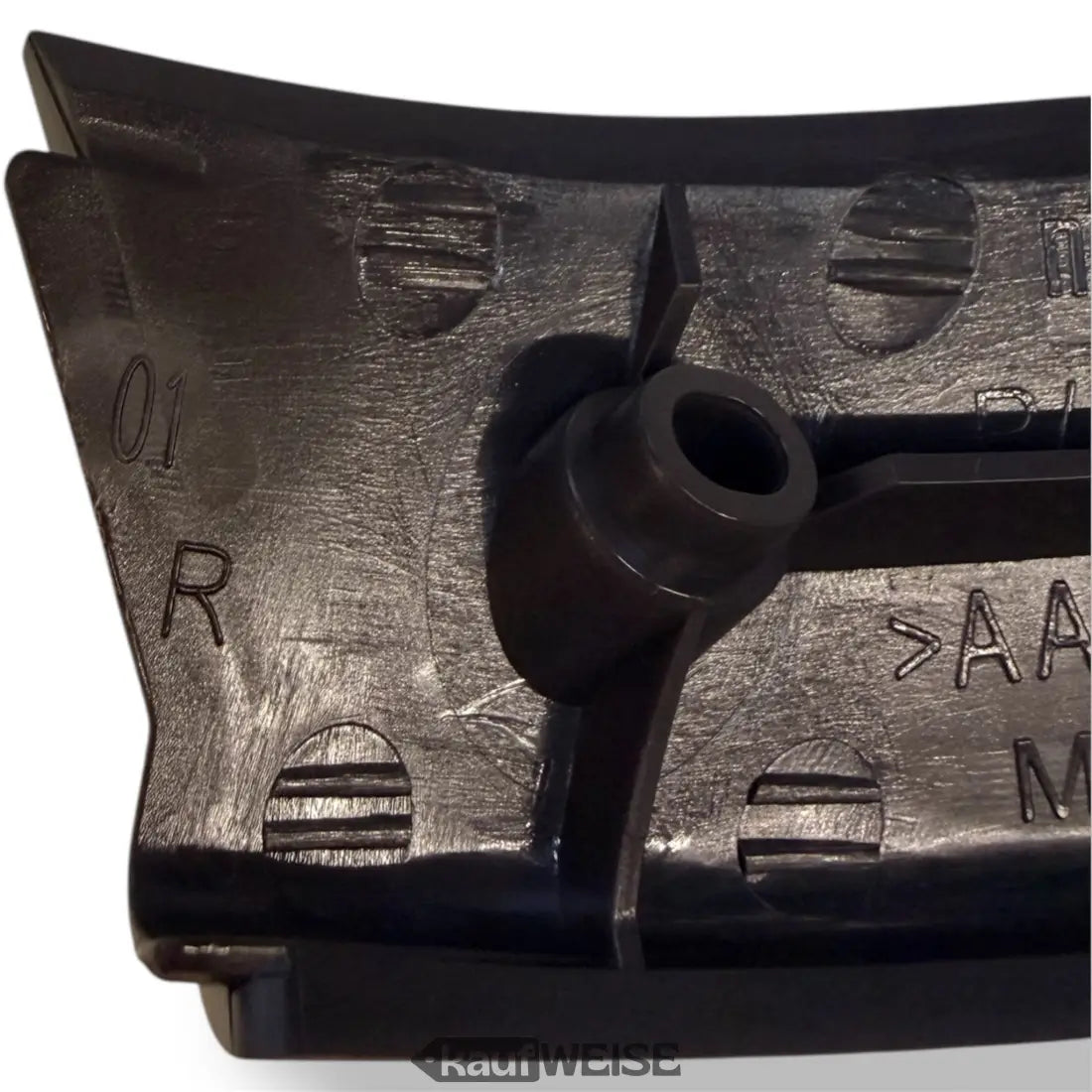 Schwarzes Kunststoff-Autogurtwicklergehäuse mit Prägungen und Vertiefungen